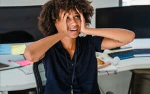 Stress factors for young professionals including social media pressure, student debt, and competitive job market